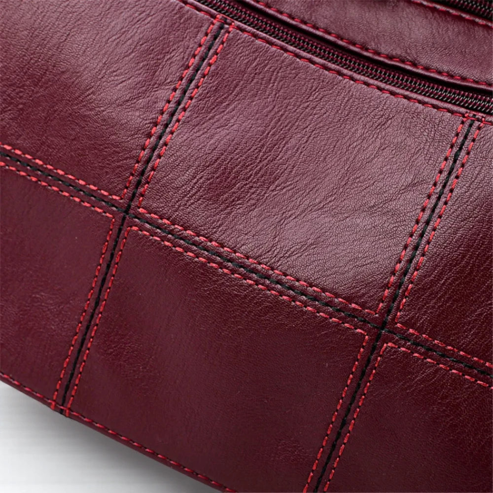 Sac bandoulière rouge femme avec surpiqûres détails