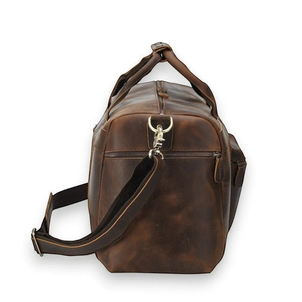 Sac de voyage en cuir véritable vintage, vue de profil