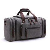 Sac de voyage homme en toile épaisse gris de trois quarts