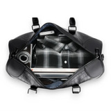 Sac de voyage imitation crocodile noir rempli