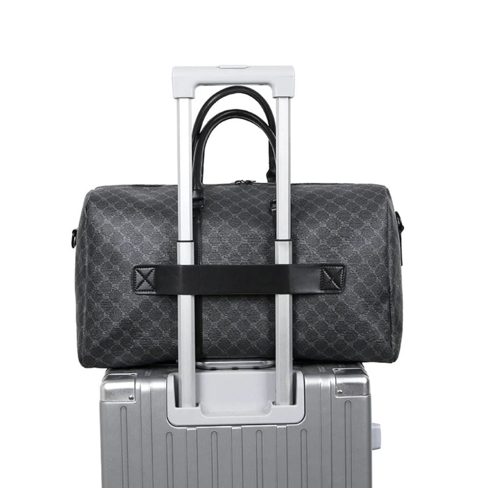 Sac de voyage mixte en similicuir sur valise trolley