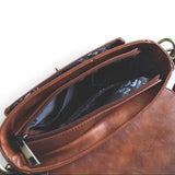 Sac à main vintage à bandoulière en cuir marron dessous, vue intérieure
