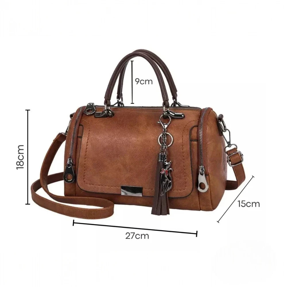 Sac à main en cuir spacieux avec pompon dimensions