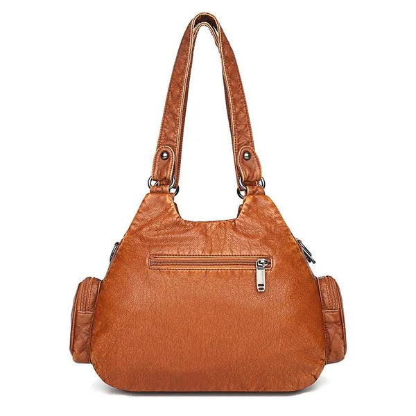 Sac à main multi-poches en cuir marron avec bandoulière derrière