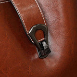 Sac seau femme en cuir ciré gros plan
